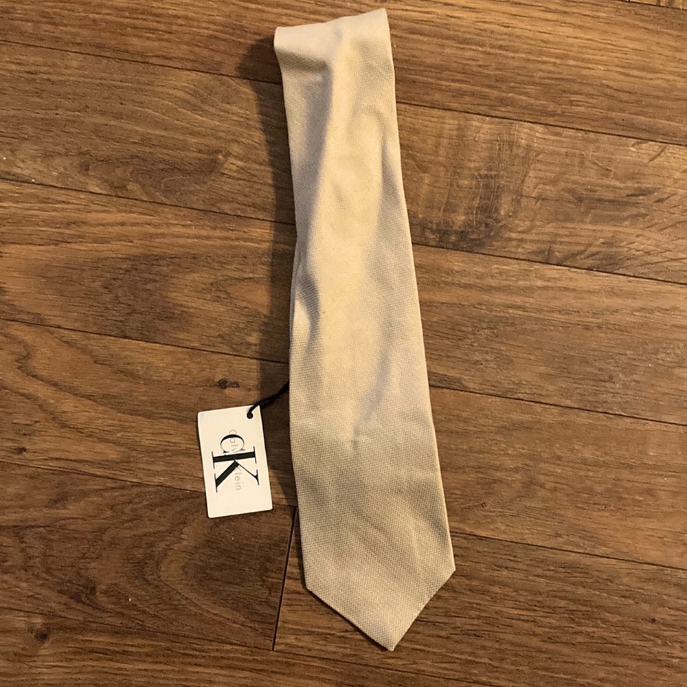 Calvin Klein unused cream tie